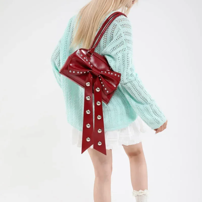 

2025 New Korean Bow Shoulder Bag Fashionable Large Capacity Tote Bag Folded Large Capacity Commuter Women's Handbag Rivet Bolsas