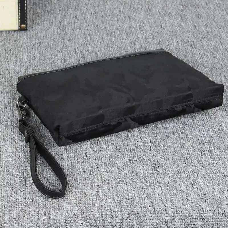 New Men's Casual Canvas Clutch Bag Large capacity Oxford handbag Printing Patterns Nylon Hand-held Bag Women Storage Bag