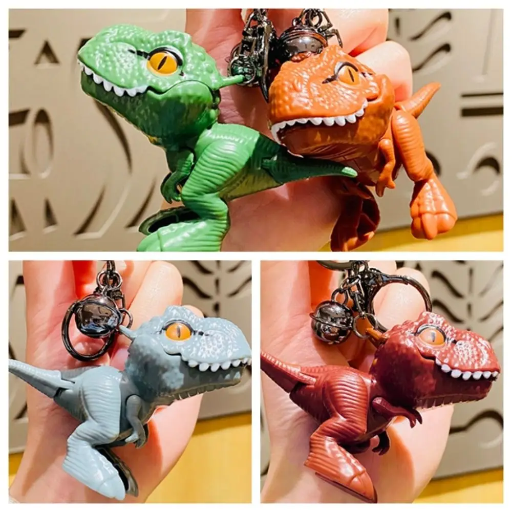 漫画恐竜ティラノサウルスレックス人形キーホルダー手を噛む恐竜の手を噛む恐竜キーリングファッションプラスチック