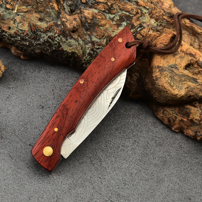 Modello laser 3CR13 Coltello a lama pieghevole in acciaio inossidabile Coltelli da tasca con manico in palissandro da campeggio all'aperto Strumento manuale per la sopravvivenza