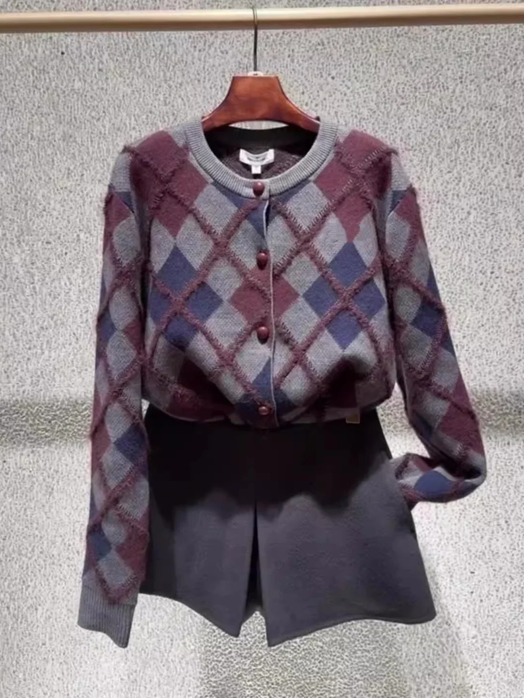 

Retro Knitted Top And Skirt Set Commute Slimming Half Skirt Two Piece Set Winter 2026 Fashion Casual Loose Fit Long Sleeve