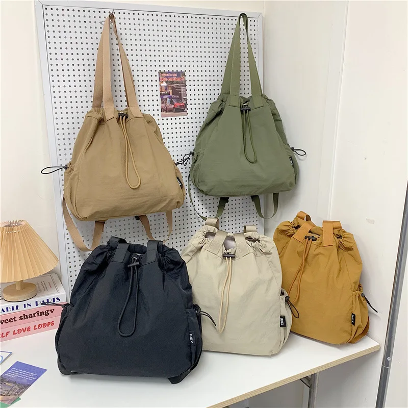 حقيبة ظهر للسفر ذات استخدام مزدوج من النايلون برباط حقيبة ظهر مقاومة للماء ذات سعة كبيرة للتسوق والأنشطة الخارجية #1