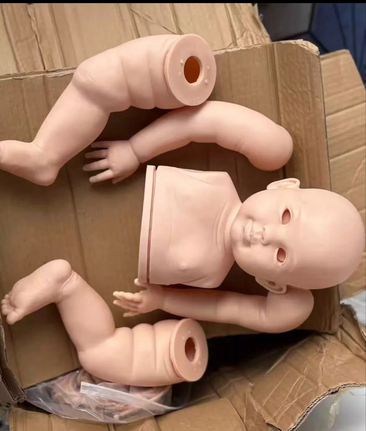 NPK Emmeline 28inch DIY Reborn Doll Kit Unfinished Unpainted Toddler Doll Parts with Cloth Body And Random Eye for Collectors