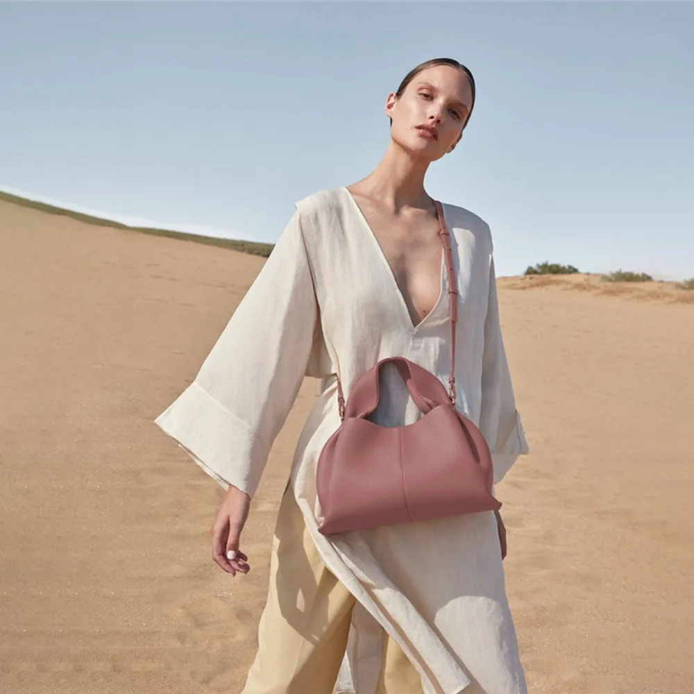 

Top Layer Cowhide Dumpling Bag Niche Catwalk Style Shoulder Messenger Bag Handbag Women's Simple Underarm Cloud Bag Quality Gift