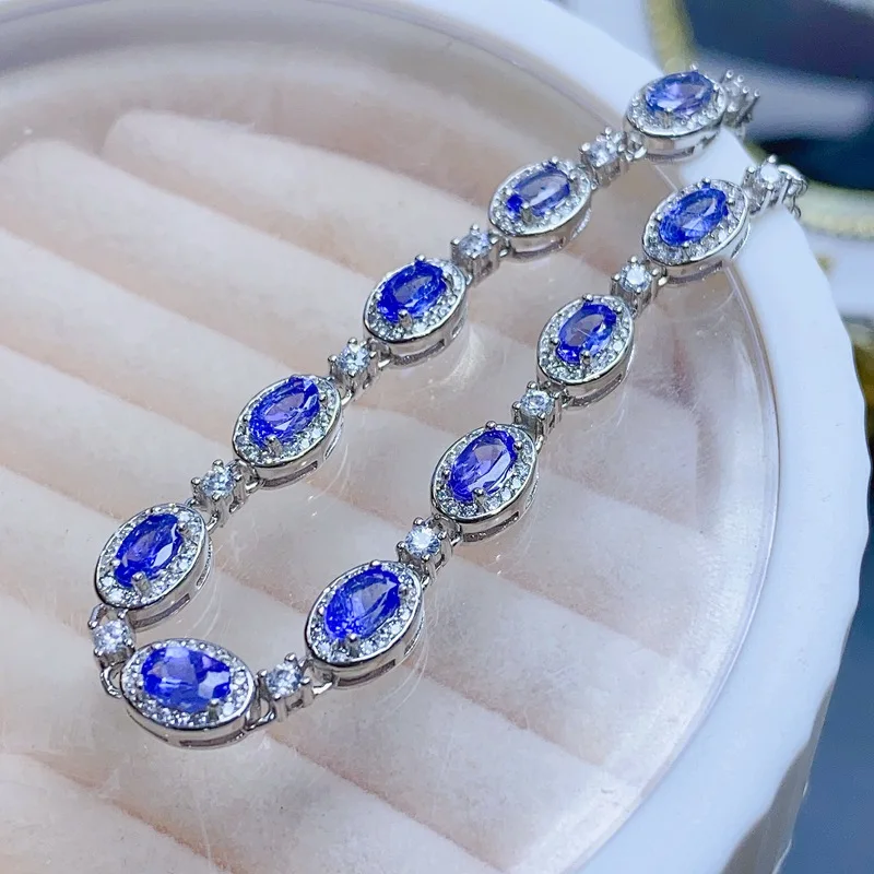 

Natural Tanzanite Tennis Bracelet 3x5mm Oval Cut 925 Silver with Halo CZ Accents Adjustable Statement Bracelet for Women