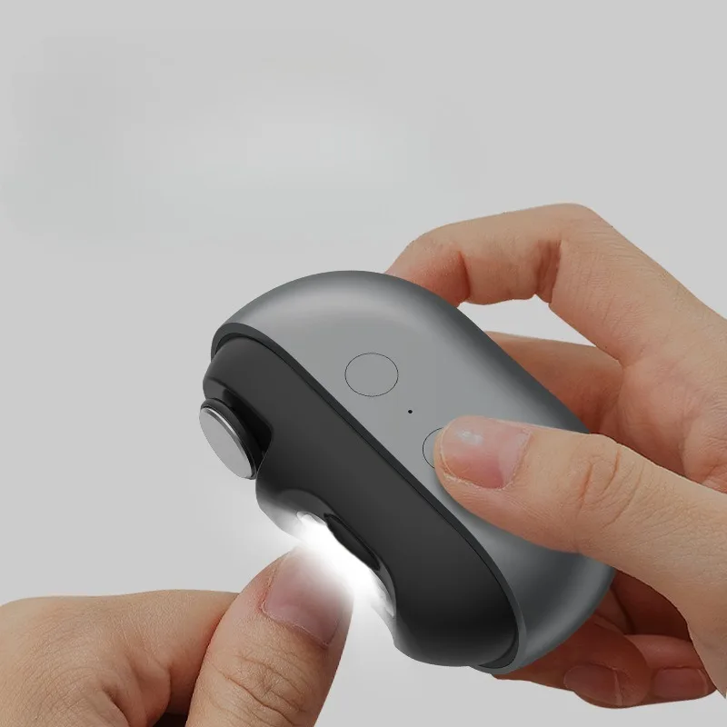 

Электрическая машинка для стрижки ногтей, безопасная конструкция обрезки, технология защиты от защемления, перезаряжаемая батарея, светодиодная подсветка, функция пилки для ногтей