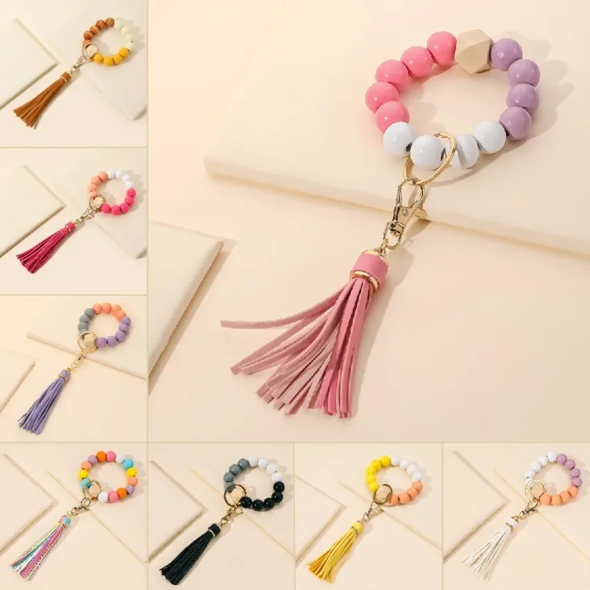 Best Selling Tassels Wood Bead Imitation SiliconeBeads Handstring Keychain Bracelet Women Men Highly Sought After Gift Key Chain