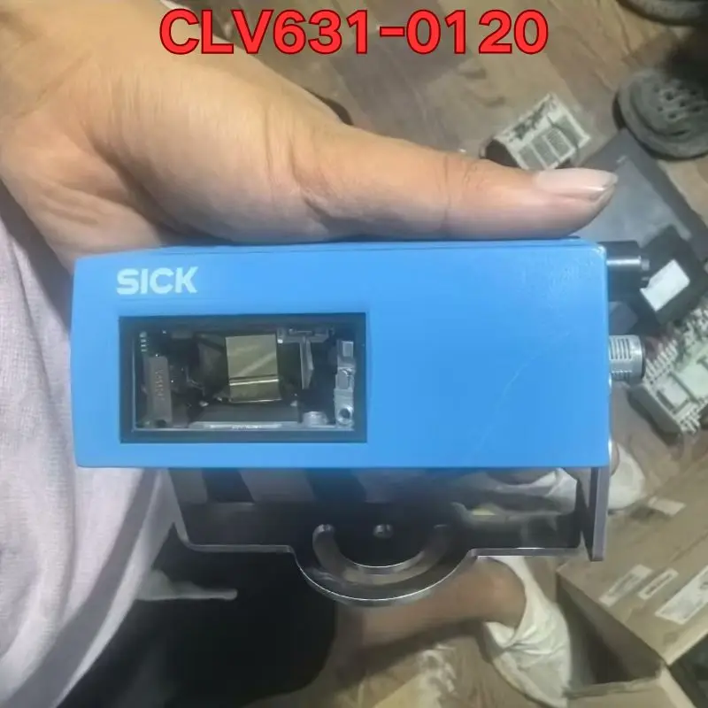 

Бывший в употреблении тест функции сканера кодов CLV631-0120 обычно
