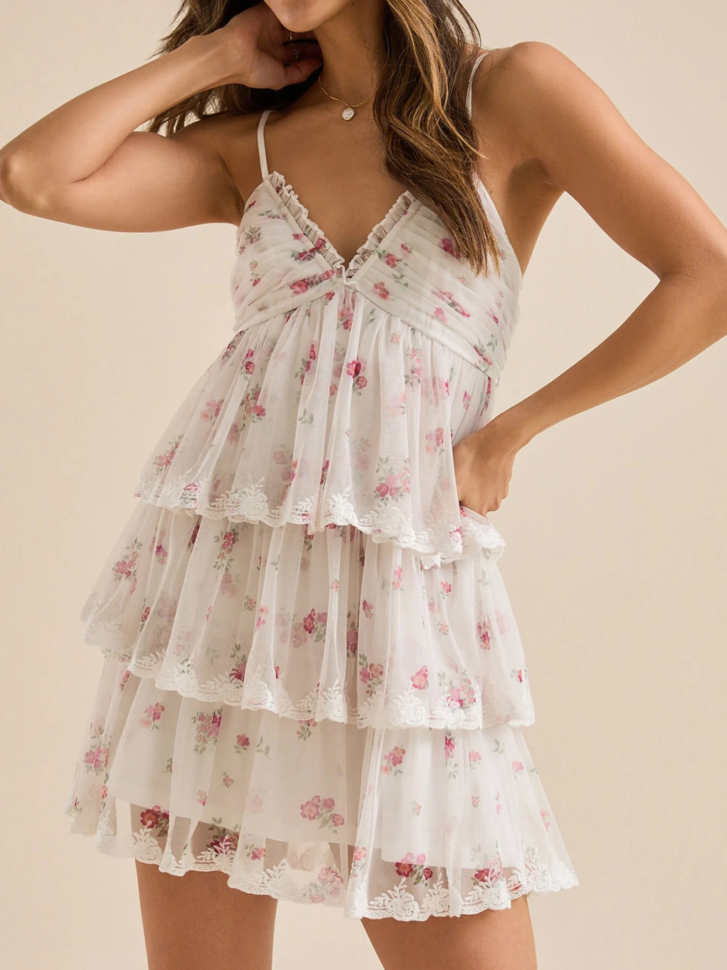 Mini robe élégante sans manches à imprimé floral, ourlet à volants, col en V, avec superposition en maille et bretelles spaghetti réglables pour la plage d'été