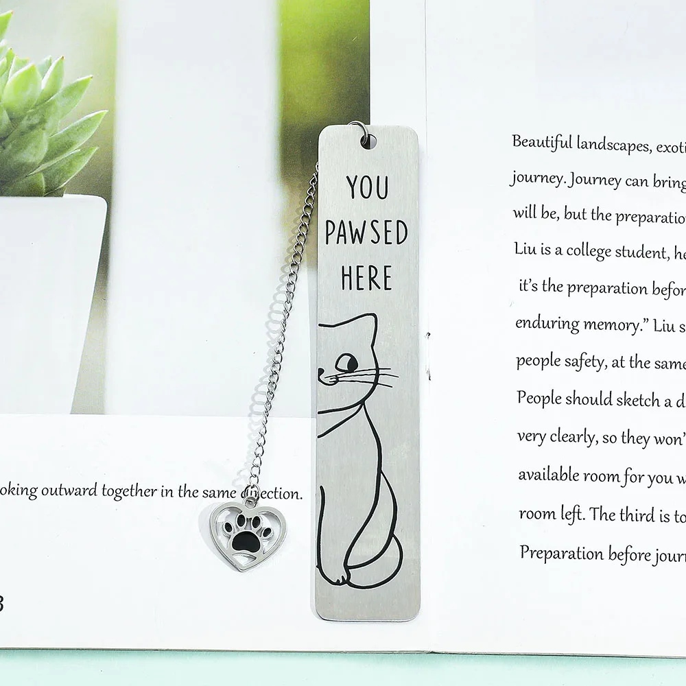 1pcs cute kitten metal stainless steel bookmark with tassel cat paw design, perfect birthday gift for fiction fans