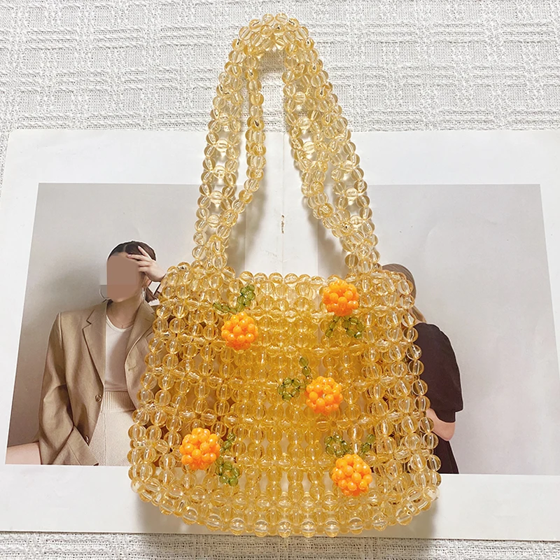 

Новинка 2024 года, однотонная большая сумка с плетением из бисера, подвесная оранжевая акриловая бусина, милая ручная сумка для девочек с милым ветром