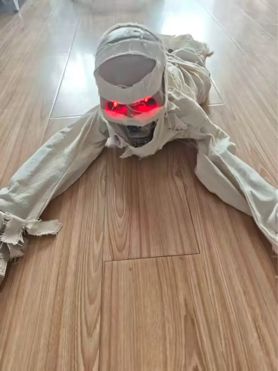 Eerie Crawling Mummy Figurine with Red Glowing Eyes Spooky Animated Halloween Prop for Indoor Scene Decor