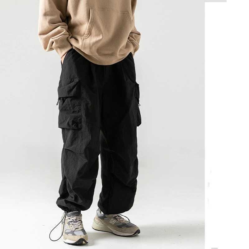 

Vintage Function Men Solar System Work Clothes Spring Loose Motion High Street Pleated Solid Color Pocket All-match Trousers