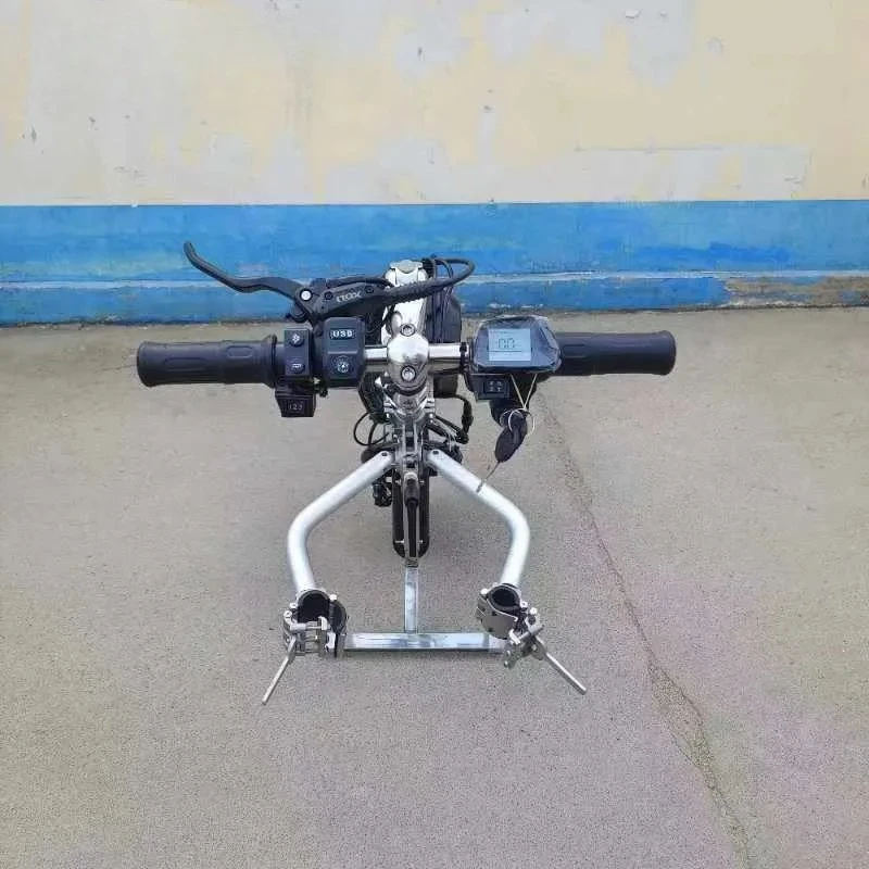 Electric drive for wheelchair front...