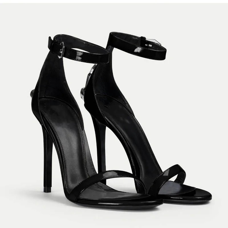 صنادل جلدية لامعة بحزام واحد خنجر السيف الأسود الصولجان عالية الكعب خمر حواف حادة مضخات أحذية النساء Chaussure