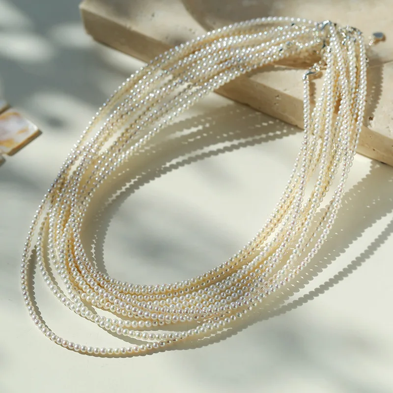 

Mini freshwater rice necklace women's versatile personality trend simple silver buckle pearl necklace