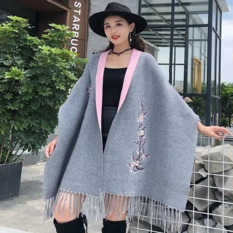 

Autumn and winter shawl women's outer cloak jacket with sleeves tassel scarf thick new style plum blossom elegant cloak JJ71