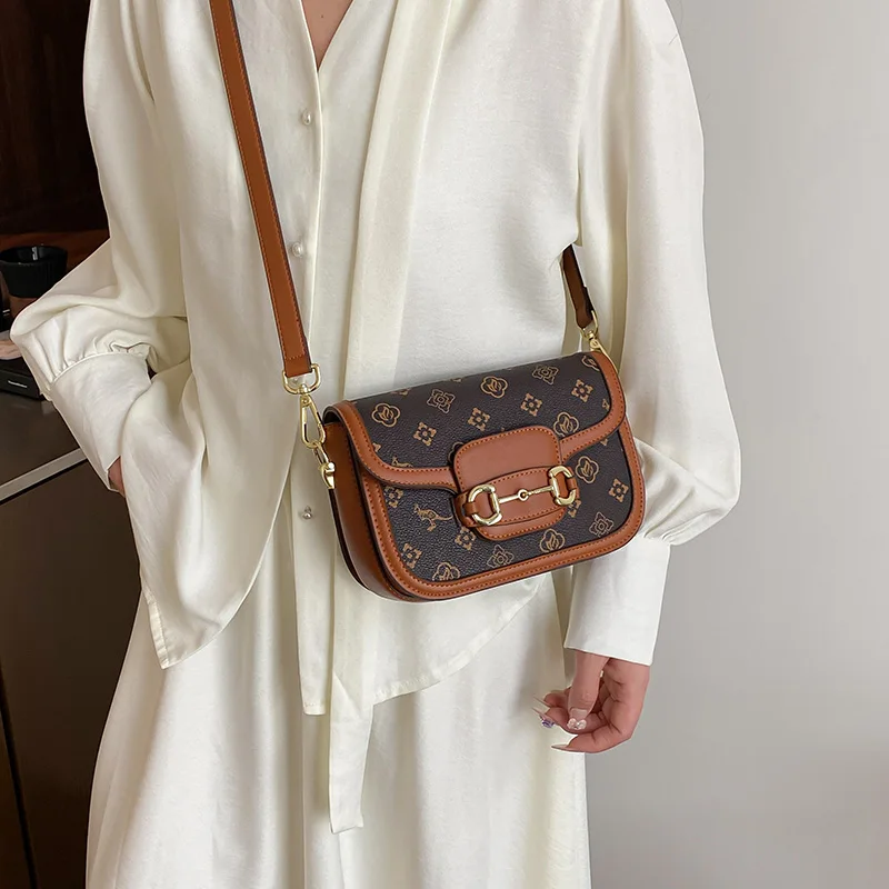 

Popular Women's Handbag With Elegant Leather Finish, Classic Design Featuring Gold Hardware By Luxury Brand