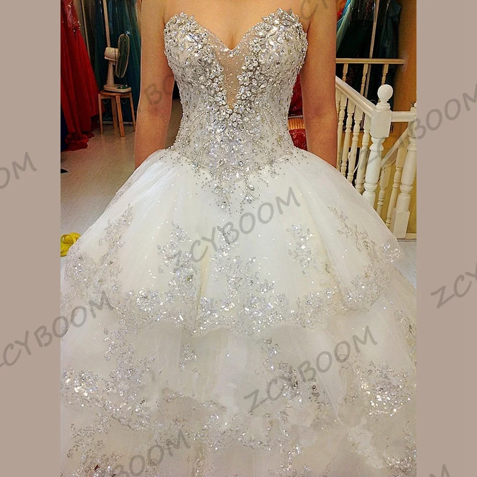 

Gorgeous Strapless Beaded Wedding Dress 2023 Floor Length Sweep Train Sweetheart Sleeveless Crystal Lace Up Bridal Gown