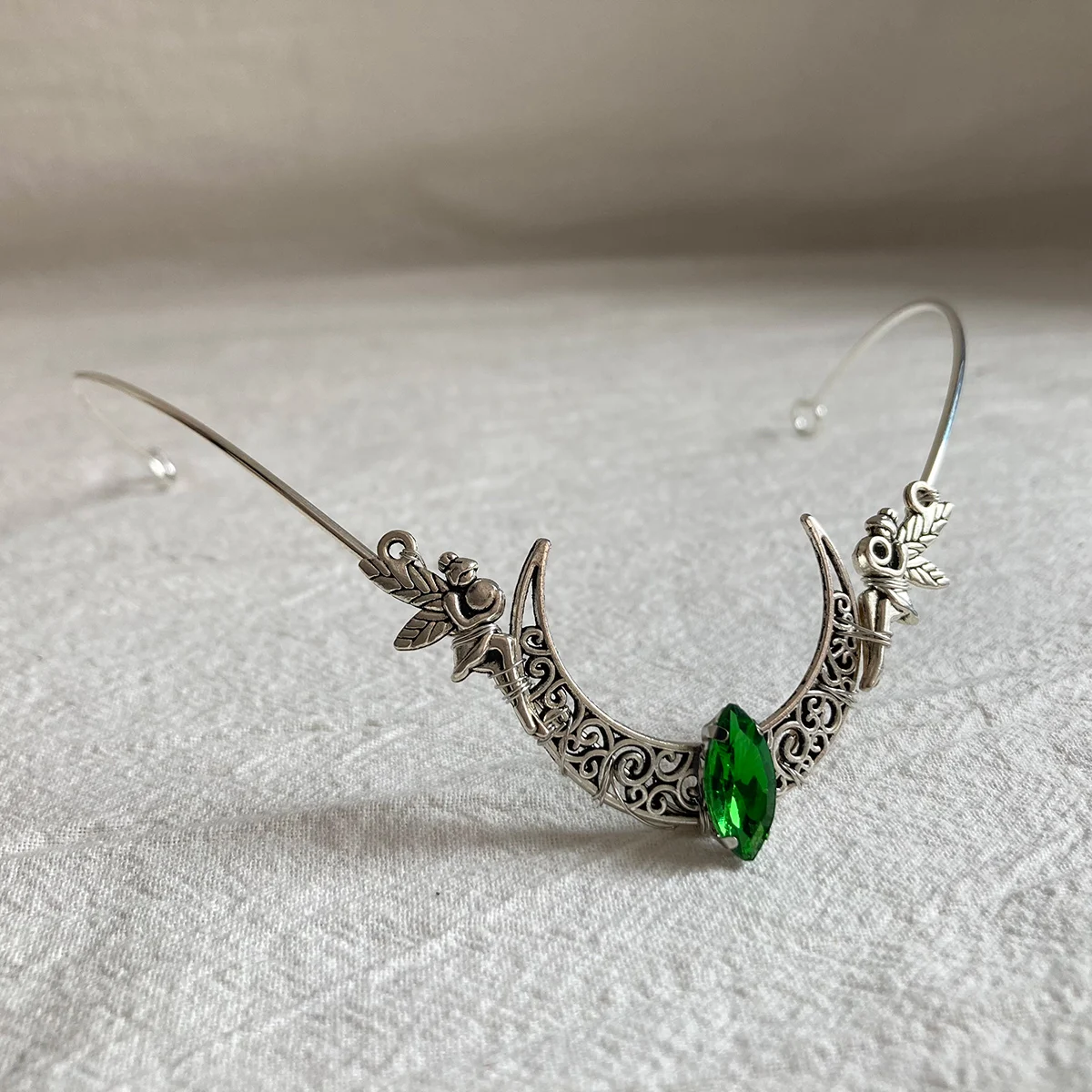 ที่คาดผมประดับพลอยเทียมรูปนางฟ้าเอลฟ์สำหรับงานแต่งงานมงกุฎเจ้าสาวสีเงินมงกุฏฮาโลเครื่องประดับนางฟ้างานเลี้ยงคอสเพลย์สำหรับผู้หญิง