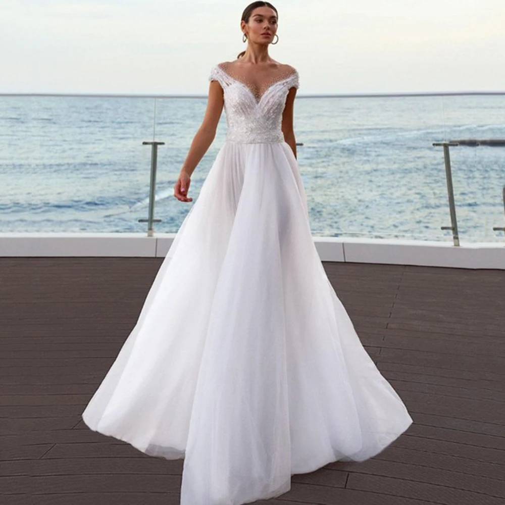 YunShang Sheer O-Neck Wedding Dress Short Cap Sleeves Side Split Pleats Beach A-Line Bride Gown Backless Train vestido de novia