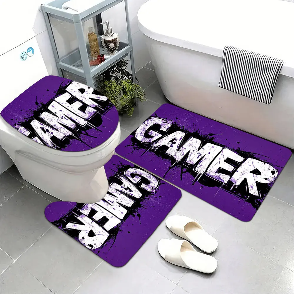 

Набор из 3 ультрамягких ковриков для ванной комнаты с нескользящей основой, украшенных логотипом геймера в стиле граффити.