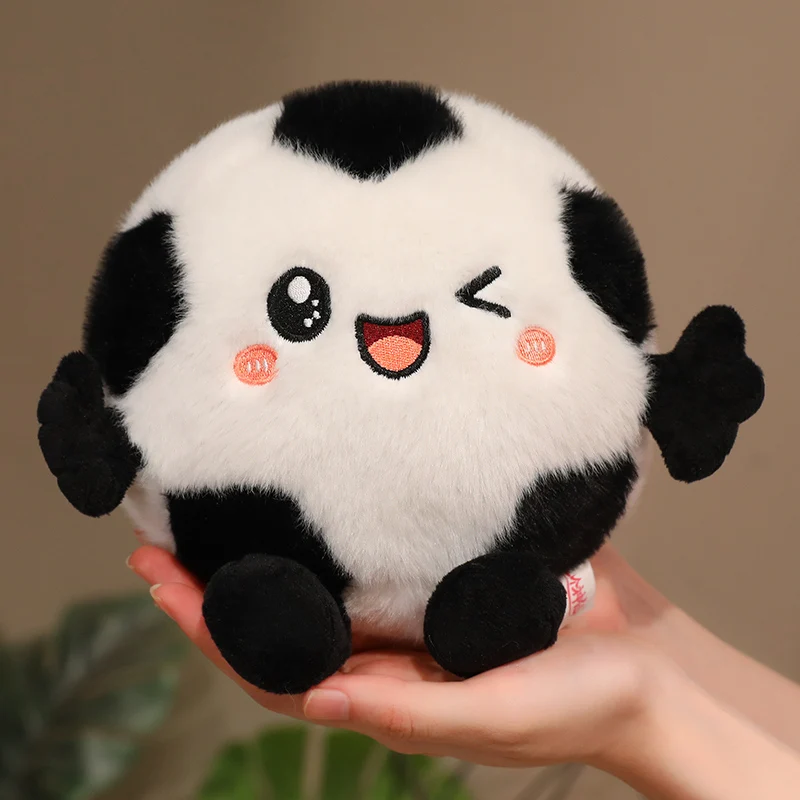Stuffed Toy Soccer Ball Plush With Winking Face Pink Cheeks And Panel Pattern For Bedside Shelf Or Office Desk Decor