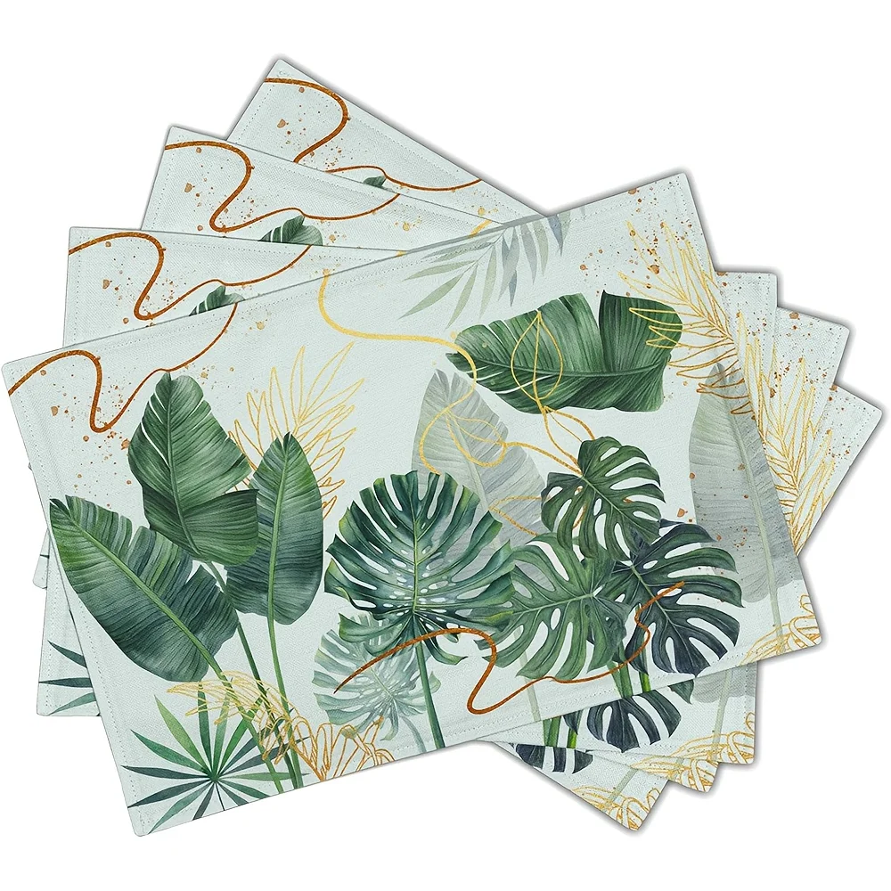 2/4-teilige Tischsets mit tropischen Palmblättern und einem Boho-Design mit grünen Blättern. Diese botanischen Tischsets für die Dekoration von Zuhause und Küche.