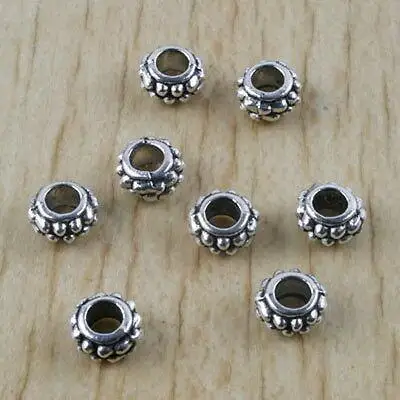 

60pcs 6.7x3.7mm hole:3.3mm Tibetan silver studded spacer beads h2940