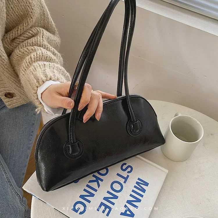 

Handheld retro fashion waxed leather baguette bag niche Joker casual Candy-colored long handle one-shoulder underarm bag