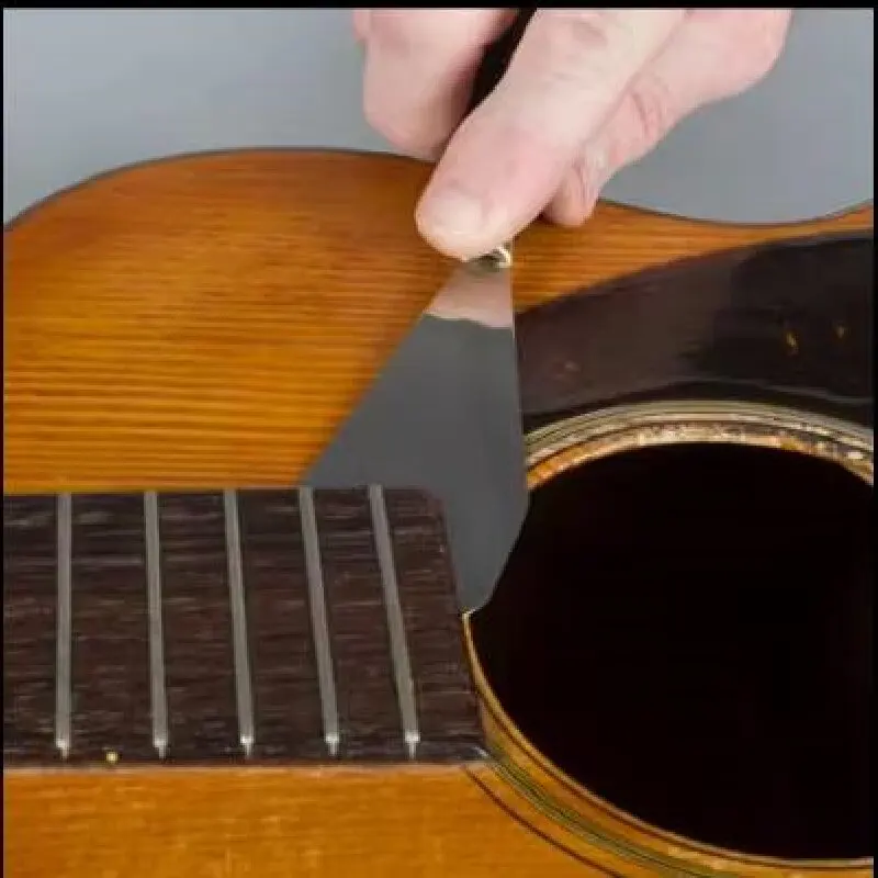 Acoustic Guitar Repair Remove Flat Shovel