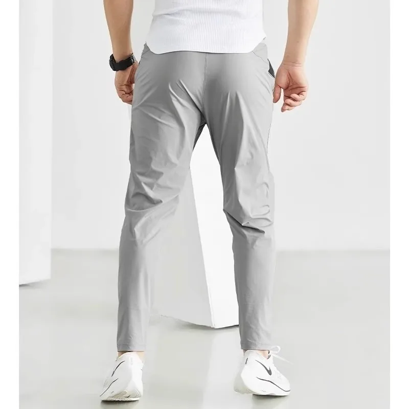 Ice Silk Thin Sports Long Pants Men Slimming Elastic Quick-drying Taping Legs Small Pants Running Zipper Pocket Fitness Pants