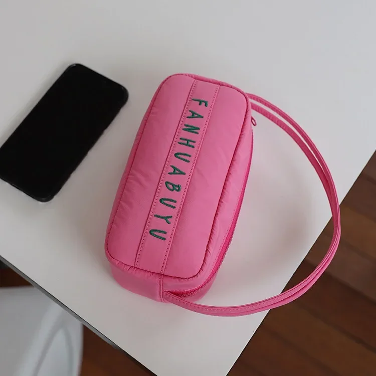 Korean version of the original new handbag female student mobile phone bag cute small bag niche design storage bag eye-catching