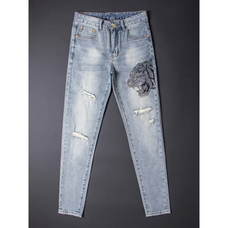 

Tiger head rhinestone print fashionable light luxury jeans for men 2025 new trendy brand slim fit small leg ripped pants