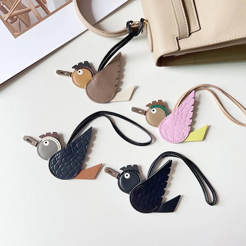 New Bird Pendant Bag, Niche Decoration, Cowhide Pendant, Cartoon Bird Keychain Accessory, Car Pendant with Label