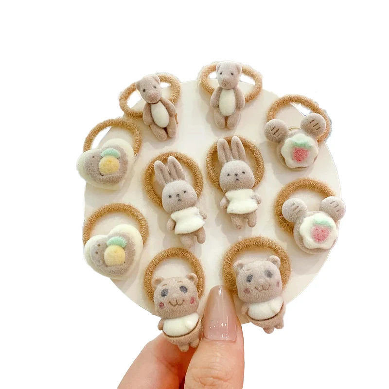 Lot de 10 élastiques à cheveux doux et mignons pour bébés filles, en acrylique, avec motifs de dessins animés, nœuds, lapins et fleurs, pour tout-petits et enfants 2026
