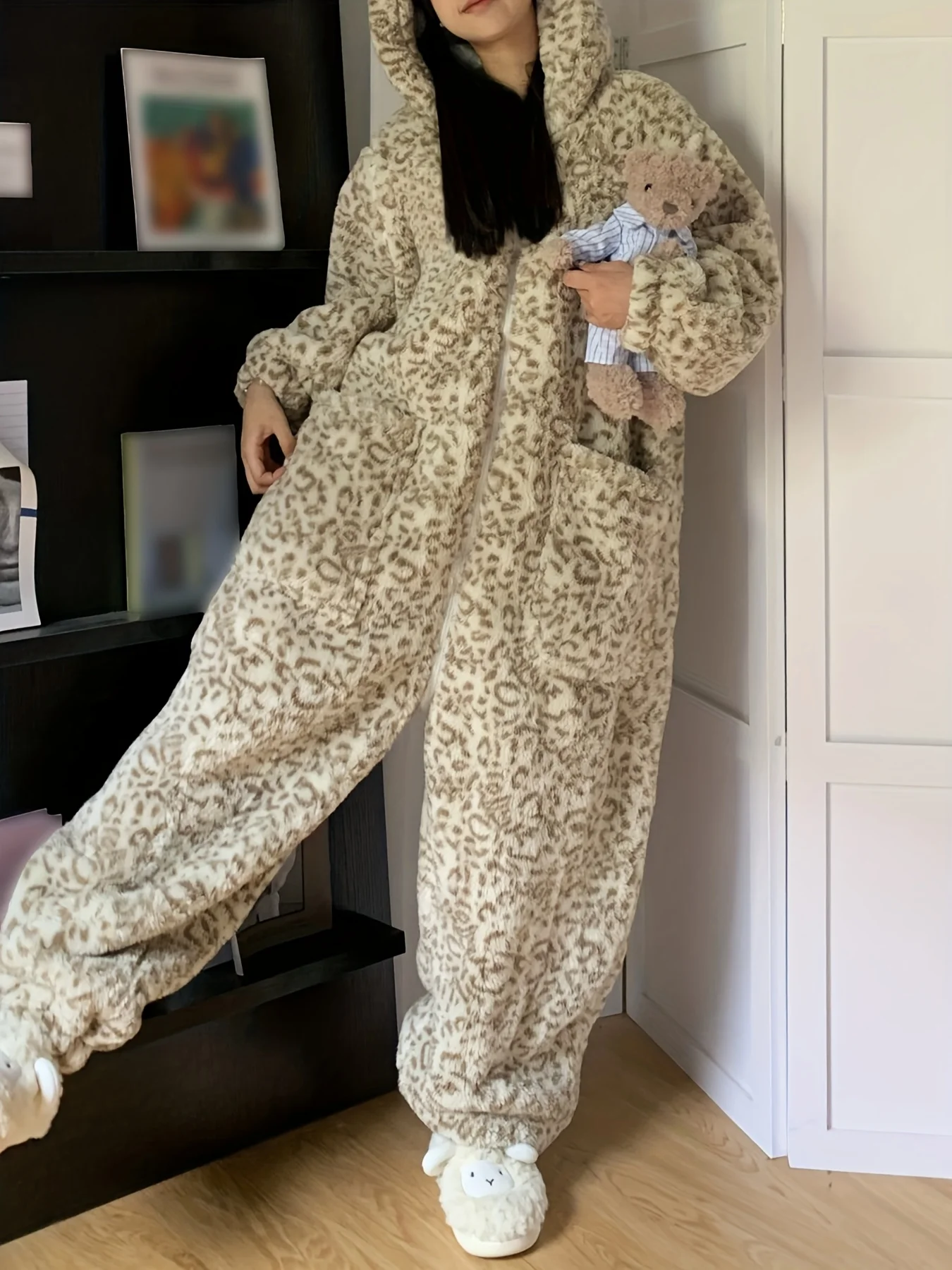 

Cozy Coral Fleece Leopard Onesie Set with Hood & Slippers. Perfect for Winter Home Relaxation! Shop Now.