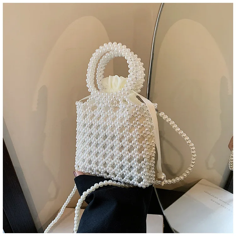 New pearl women\'s bag hand-beaded finished fashion catwalk women\'s cross-body bag light luxury texture net red mobile phone bag
