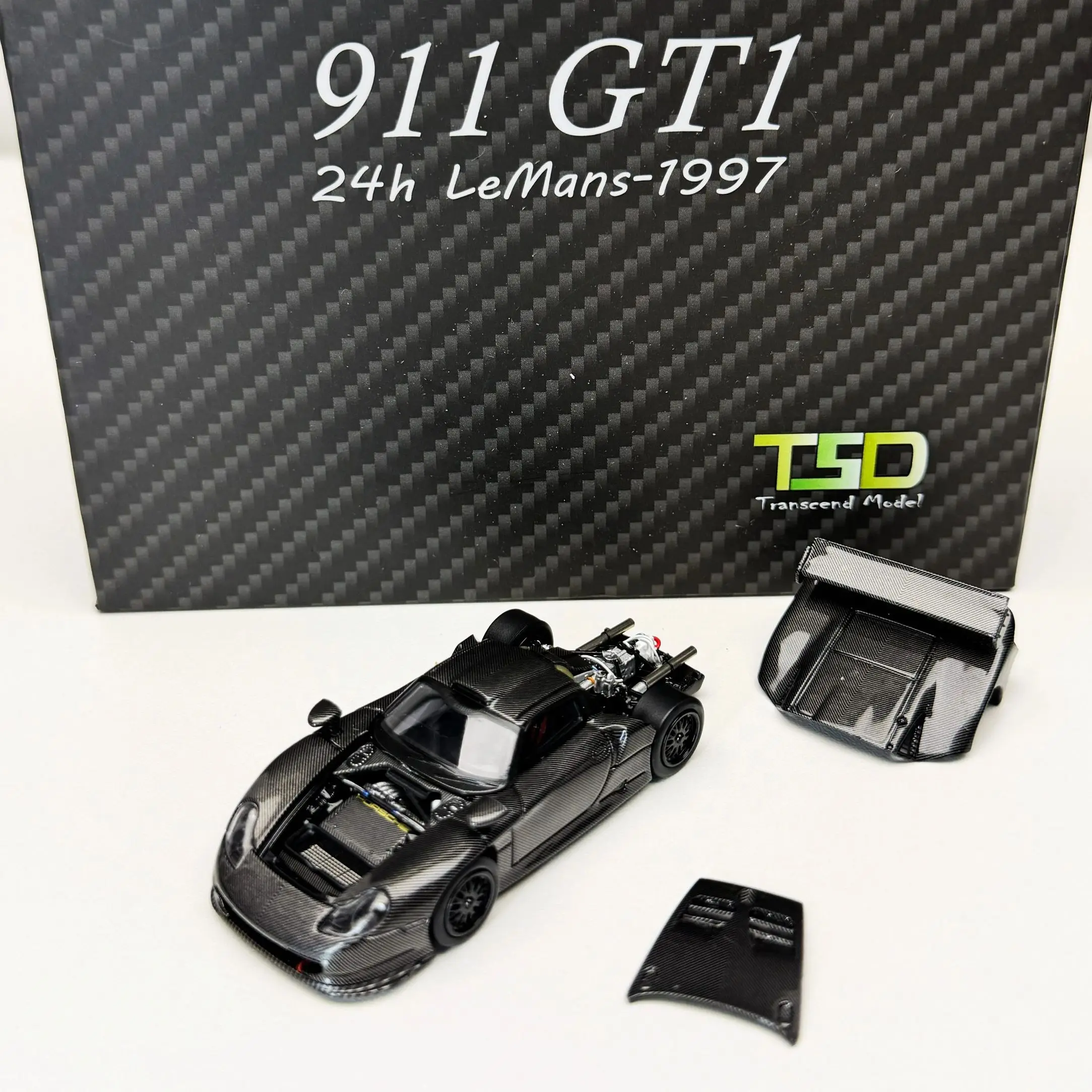 

Transcend Model 1:64 Porsche 911 GT1 LeMans 1997 Full Carbon Body Openable Front And Rear Hood Alloy Diecast Model Car