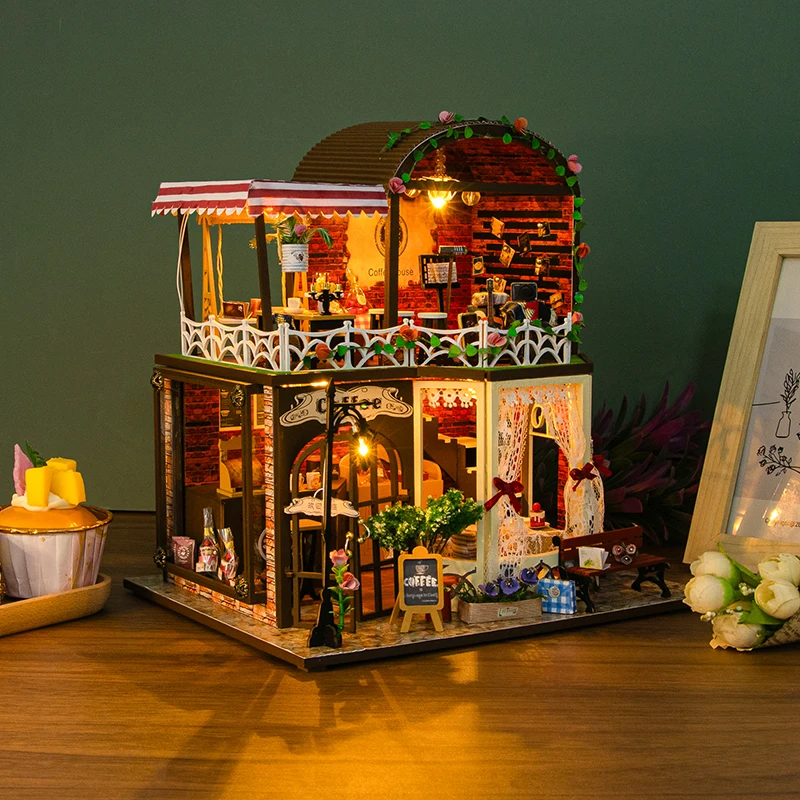 Kit di costruzione in miniatura in legno fai-da-te Case delle bambole Cottage del tempo di Raya con mobili Luce Casa Case delle bambole Amici Regali di compleanno
