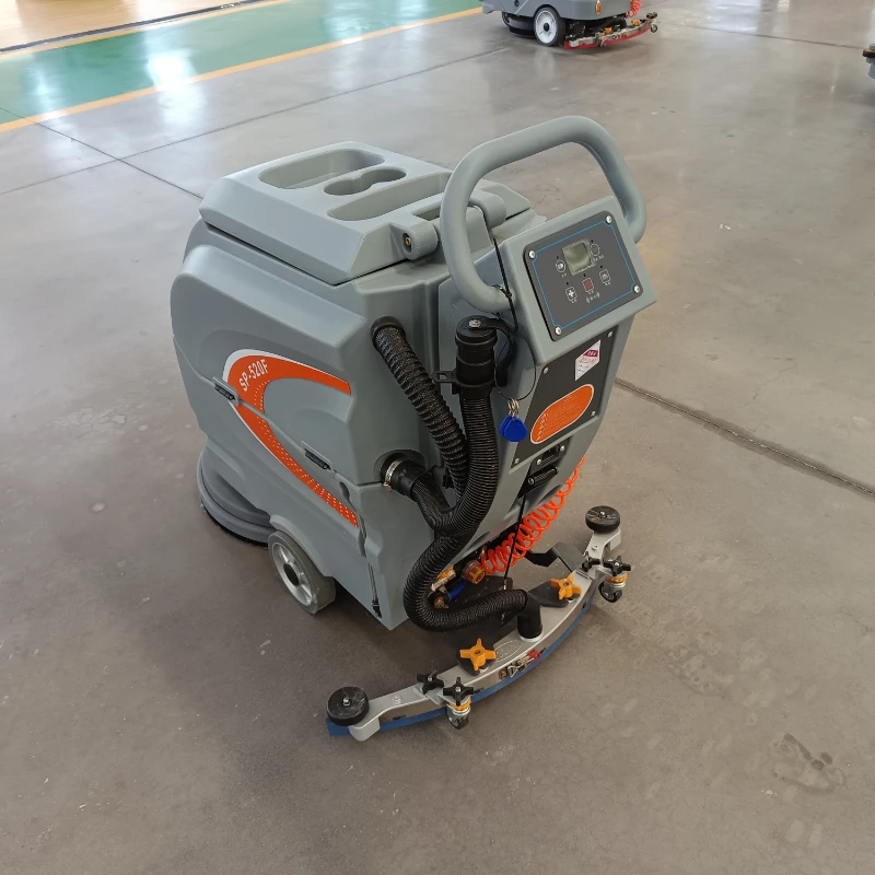 Struggling with dust and oil? One pass with our ride-on scrubber.