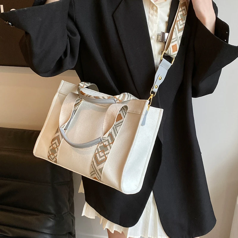 Cross border Fashion Canvas Handbag Simple Wide Shoulder Strap Single Shoulder Bag Lightweight Commuting Women Crossbody Bag