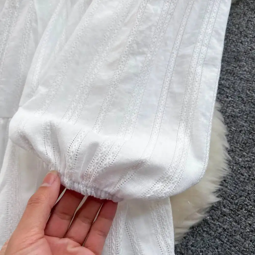 Abito da spiaggia bianco elegante da donna Primavera Autunno Abiti corti a vita alta vuoti in pizzo Abiti vintage Boho a maniche lunghe