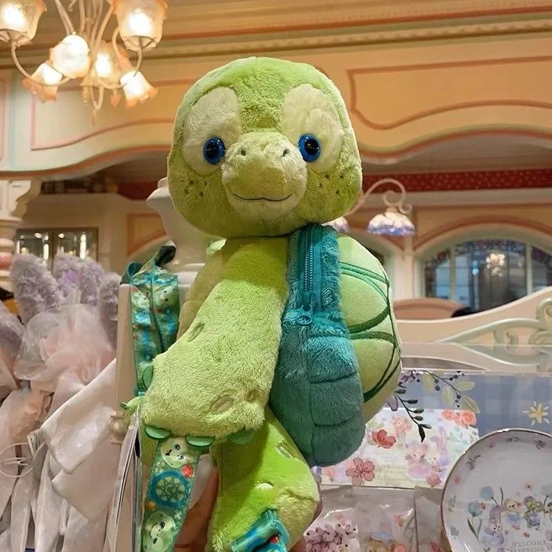 ディズニー Olu Mel リトルタートルぬいぐるみ充填子供のバックパック小銭入れ女の子かわいい装飾人形子供の誕生日ギフト