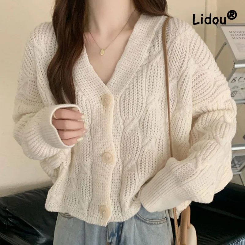 Fashion Solid Color Button Sense of Design Sweaters Cardigan Loose Coat New Long Sleeve Casual Simplicity All-match Lady Top