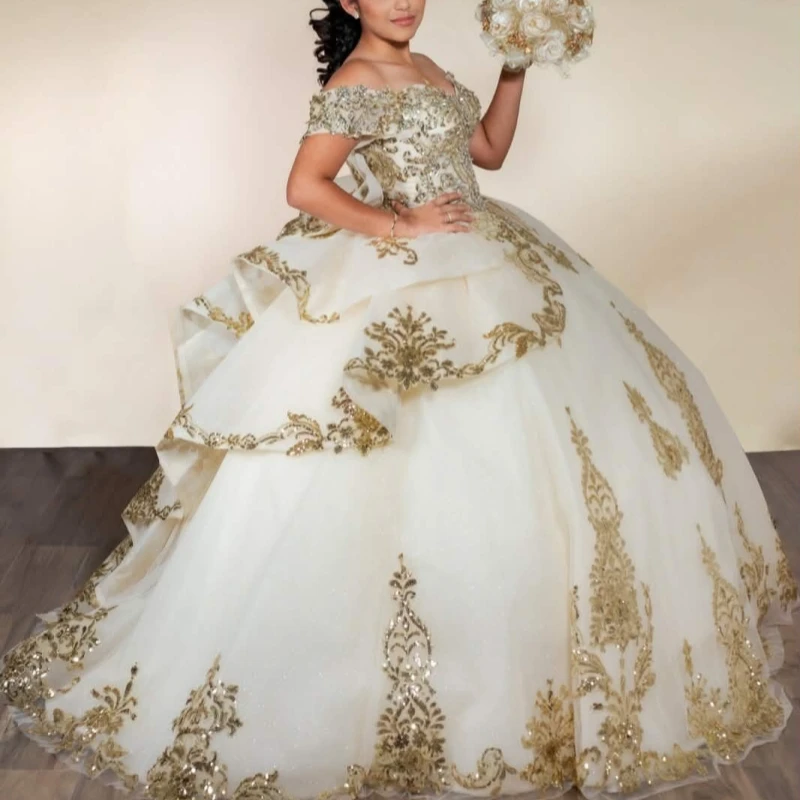 

Ivory Shiny Ball Gown Quinceanera Dresses Gold Applique Lace Beading Crystal Bow Tiered Tull Corset Off The Shoulder Sweet 16