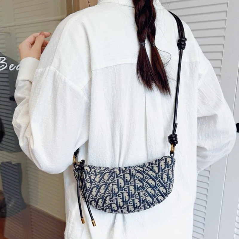 

Новая модель сумки подмышки 2025 года, креативный индивидуальный дизайн, универсальная сумка через плечо, подходящая для рабочих женщин, высококачественное качество изготовления