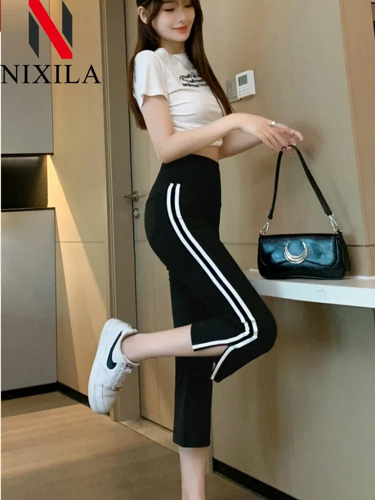 Pantalones de 7 puntos de verano para mujer, pantalones finos de tiburón, pantalones de Yoga cómodos muy elásticos, pantalones cortos deportivos de cintura alta abiertos acampanados