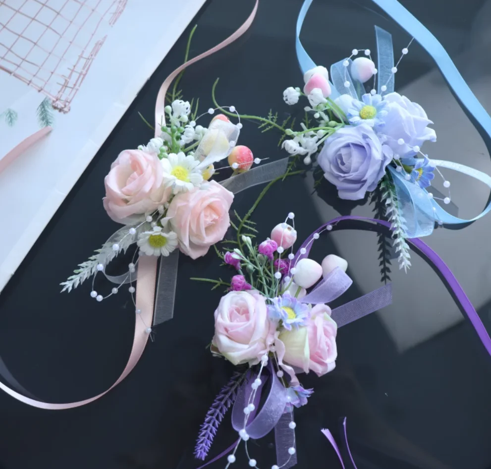 

Forest wedding white, blue and purple bride and groom wedding corsage groomsman bridesmaid and sisters group wrist flower