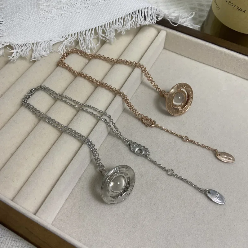 المألوف صف مزدوج ثلاثية الأبعاد زحل UFO قلادة المرأة سلسلة الترقوة ضوء تصميم فاخر الإحساس الوهق قلادة مجوهرات